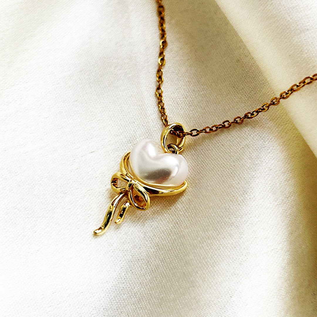Golden Pearl Heart Bow Pendant