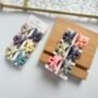 Mini Bow Clutcher